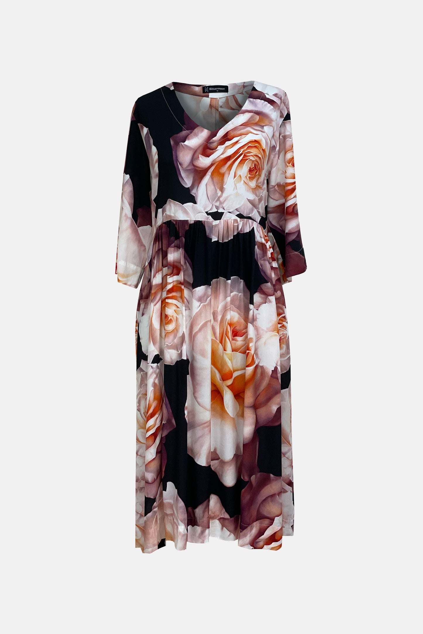 Bittermoon Charisma Dress in apricot – midi-length, V-neckline, relaxed silhouette, short sleeves, made in New Zealand