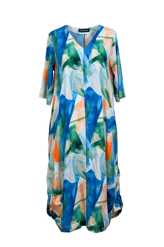 Bittermoon Viva Dress in Lagoon – abstract print midi in blue, green, and peach. Cocoon shape with side ruching and ¾ sleeves. Made in New Zealand.